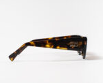 MiuMiu Sunglasses in Tortoise Brown - Image 