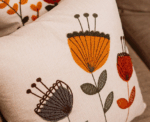 Modern Bloom – Stylized Trio Flowers Cushion - Image 