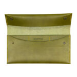 Handmade olive green leather wallet by Crosstitch Leather featuring snap buttons and a spacious interior.