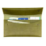 Crosstitch Leather olive green long wallet holding cards and cash, made from full-grain vegetable-tanned leather.