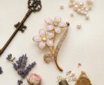 Ivory Twin Blossom Crystal Brooch - Image 