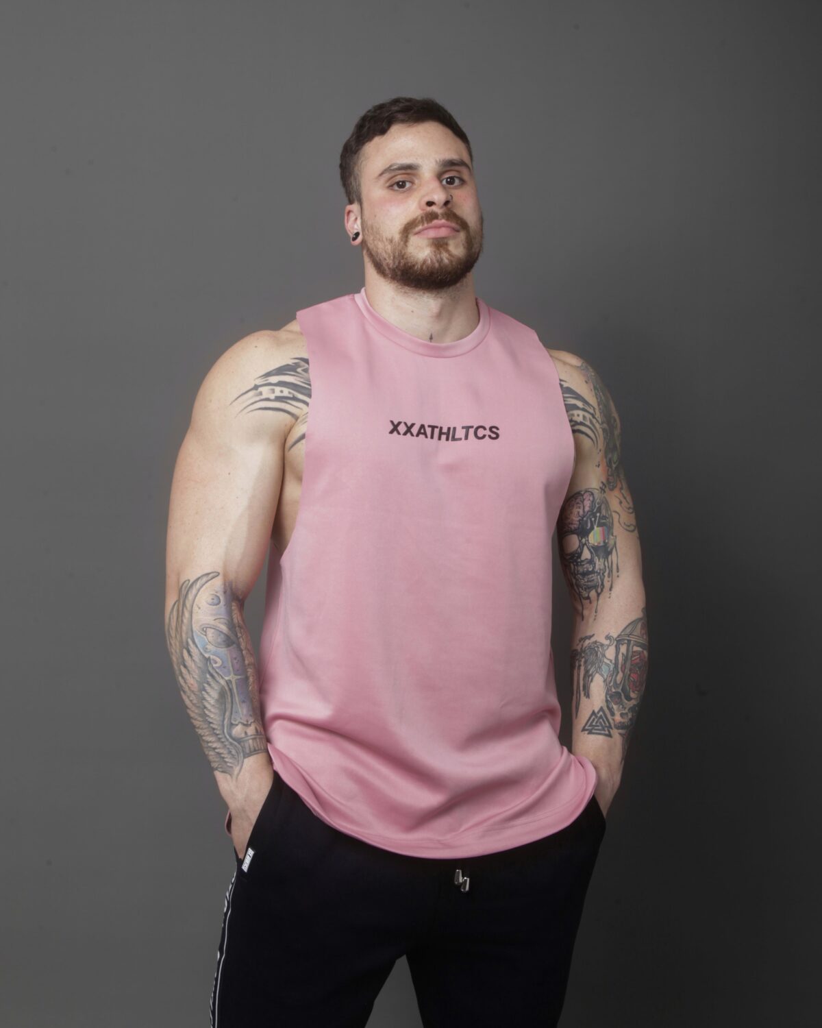 0CE82DDF-A833-4E9D-BAF1-AFA8AF974E3B XXATHLTCS Oversized Fit Tank Top - Pink