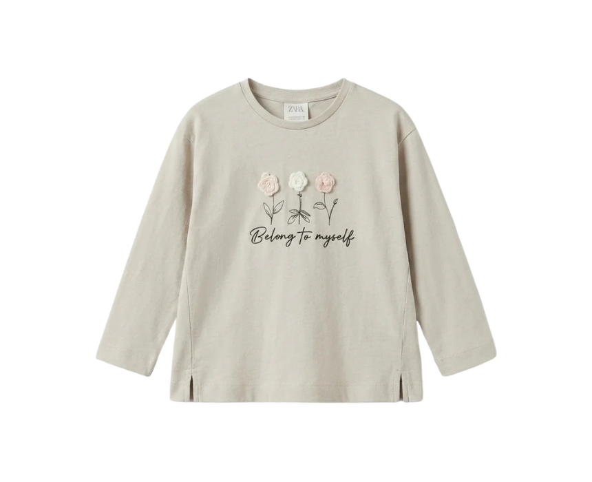 5 Zara Girls Beige Graphic Script Blouse - Image 1