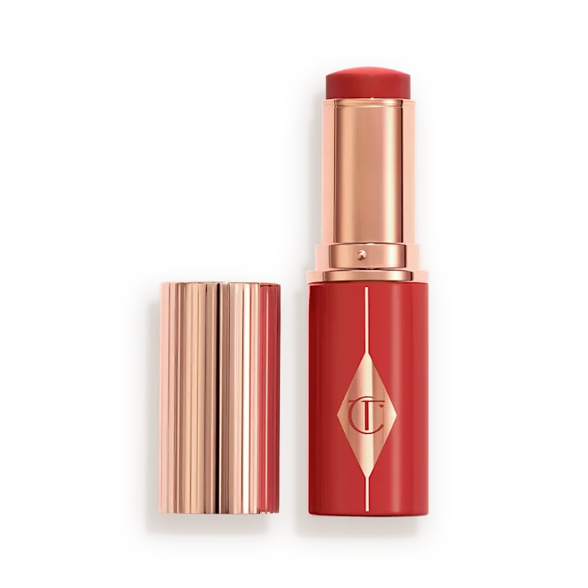 CherryGlow_Open CHARLOTTE TILBURY UNREAL LIP + CHEEK GLOW BLUSH STICK WITH HYALURONIC ACID (CHERRY GLOW)