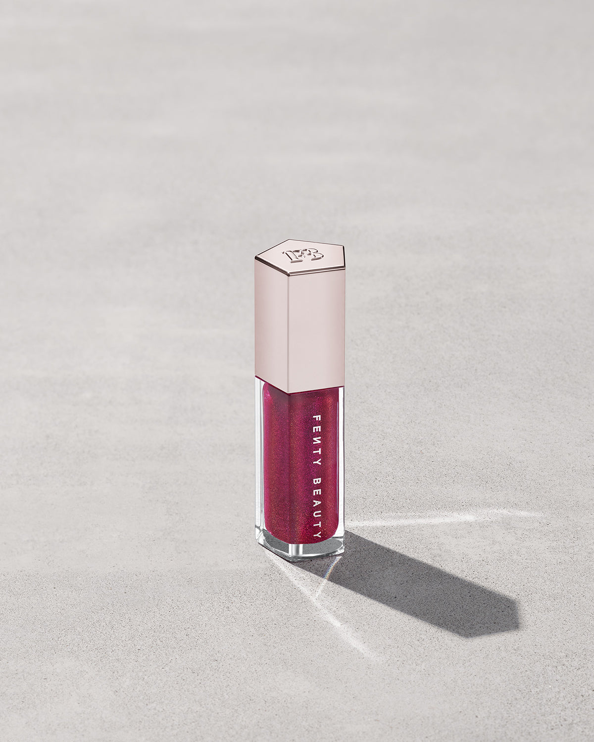 FB_SPR24_T2PRODUCT_ECOMM_ROBLOX_GB_UNIVERSAL_FUCHSIAFLEX_CLOSED_002_sRGB300 FENTY BEAUTY BY RIHANNA GLOSSBOMB UNIVERSAL LIP LUMINIZER (FUSHIA FLEX)