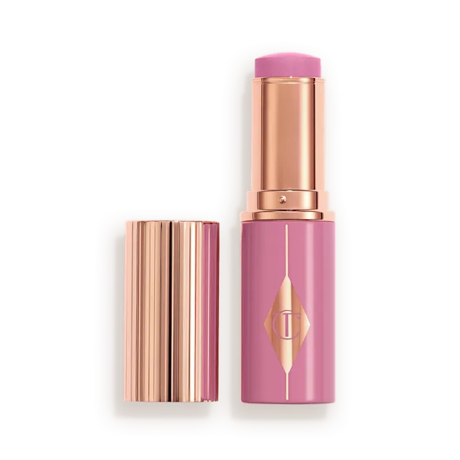 PrettyGlow_Open__1 CHARLOTTE TILBURY UNREAL LIP + CHEEK GLOW BLUSH STICK WITH HYALURONIC ACID (PRETTY GLOW)