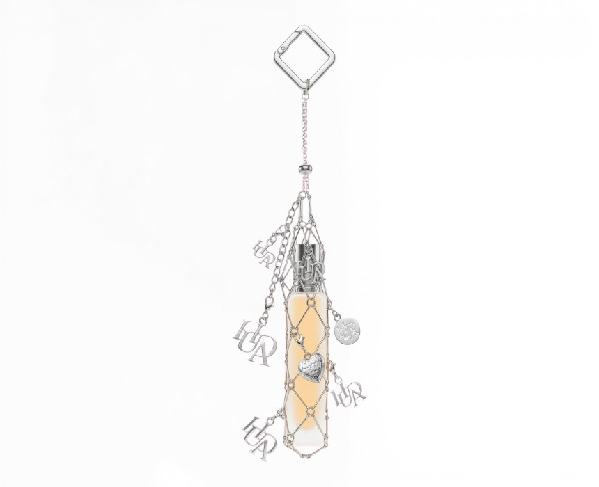 image - 2026-07-14T162230.055 HUDA BEAUTY TRAVEL SPRAY FRAGRANCE HOLDER WITH CHARMS - Image 1
