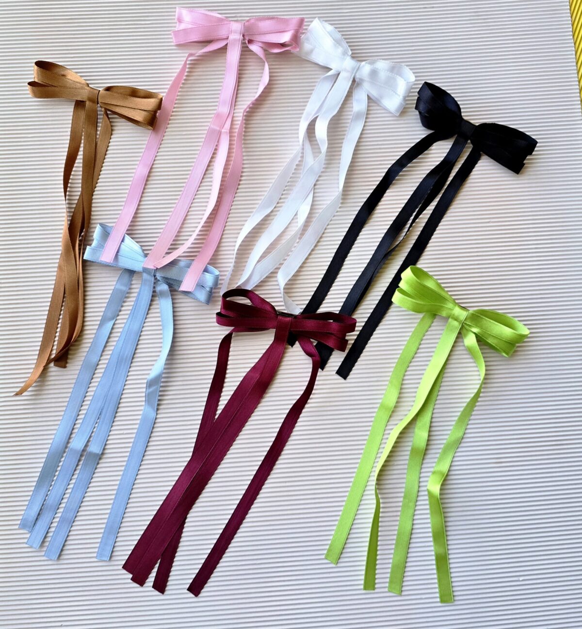 1000437072-scaled-1 B.Dangling bows