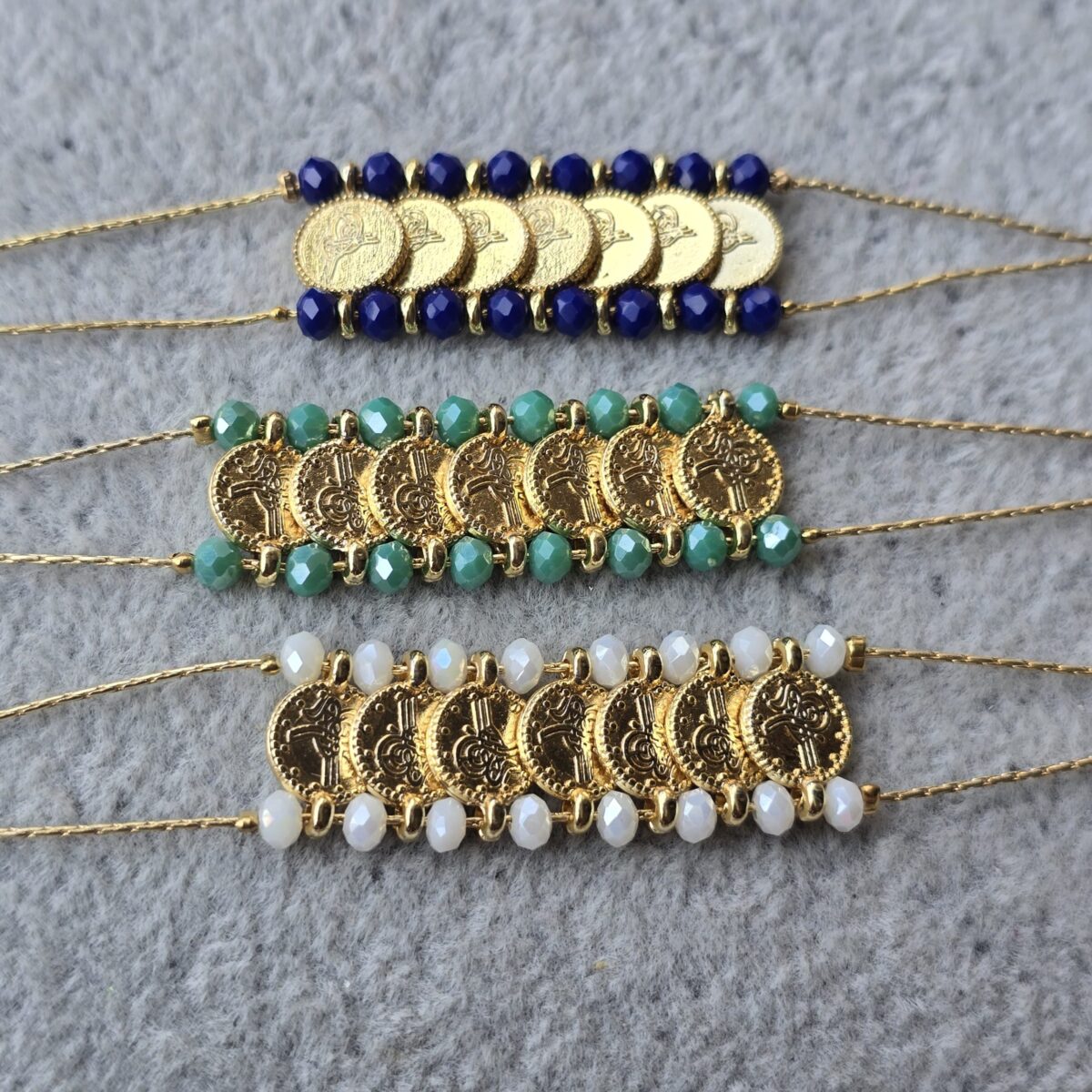 A. Coins Bracelets