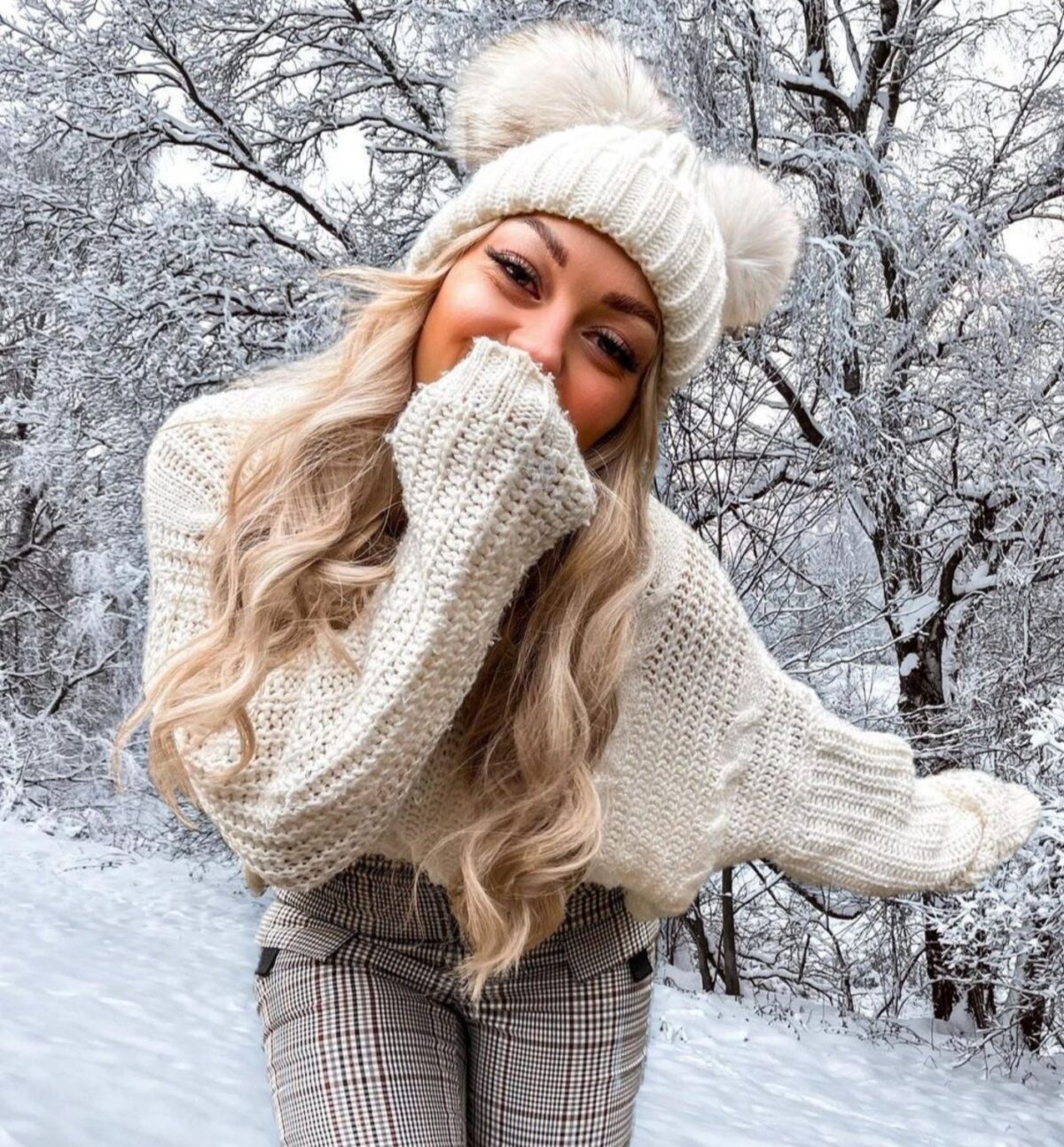 A A . The Double Pom Beanies
