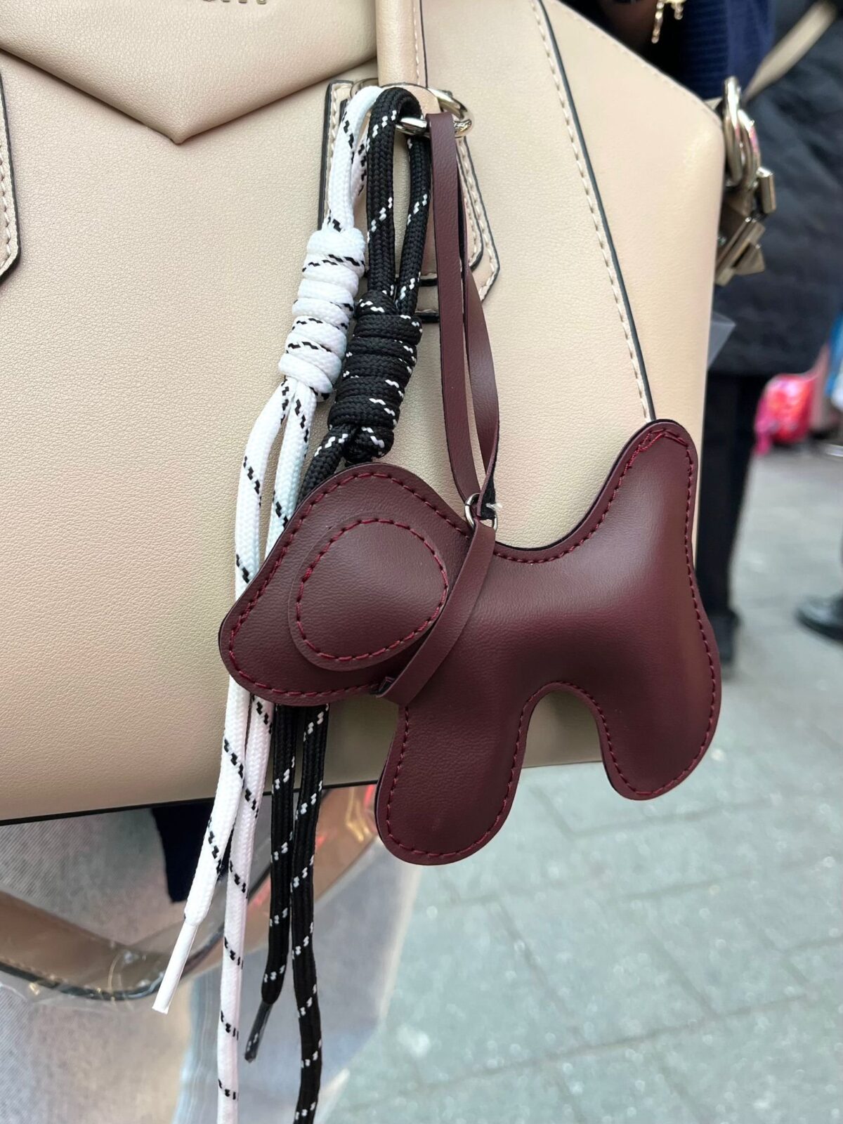 1001080938 A. Bag Charms: Burgundy Puppy