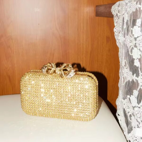 Royal Ribbon Golden Clutch