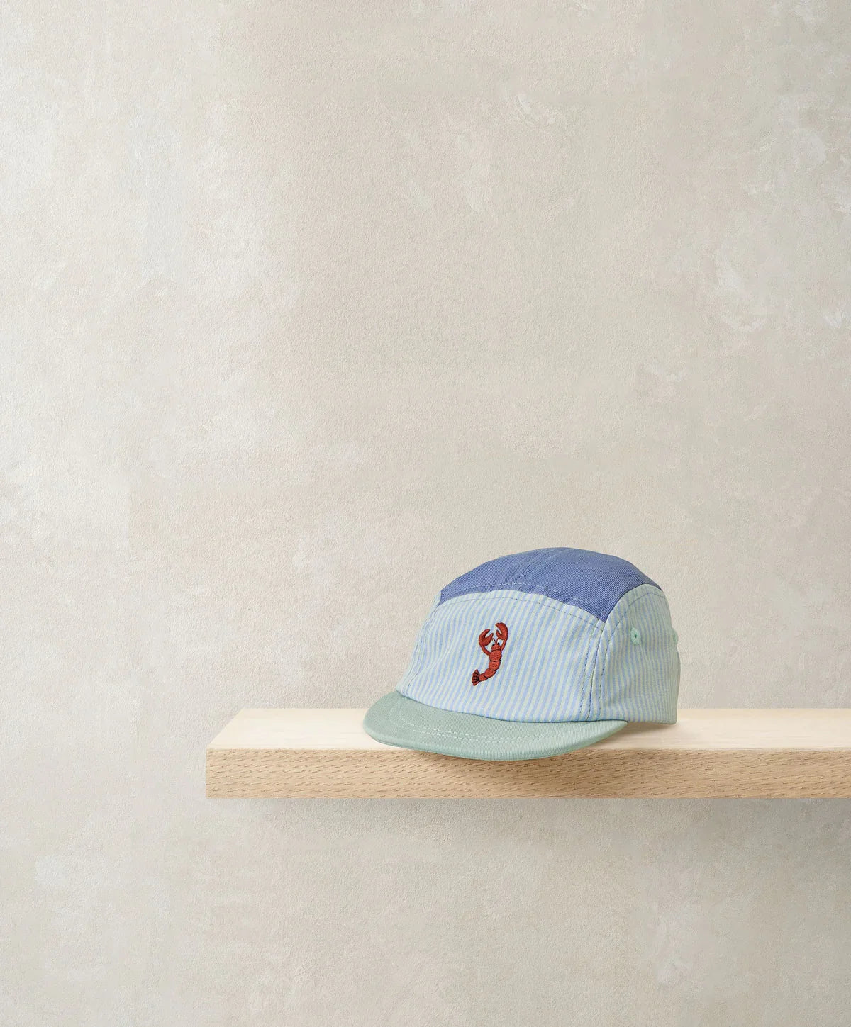 S83ZN3CB2_5f2a911b-8344-4f14-83d5-0c4063c3e107 Blue Striped Cap