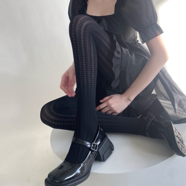 A. Timi Black textured tights